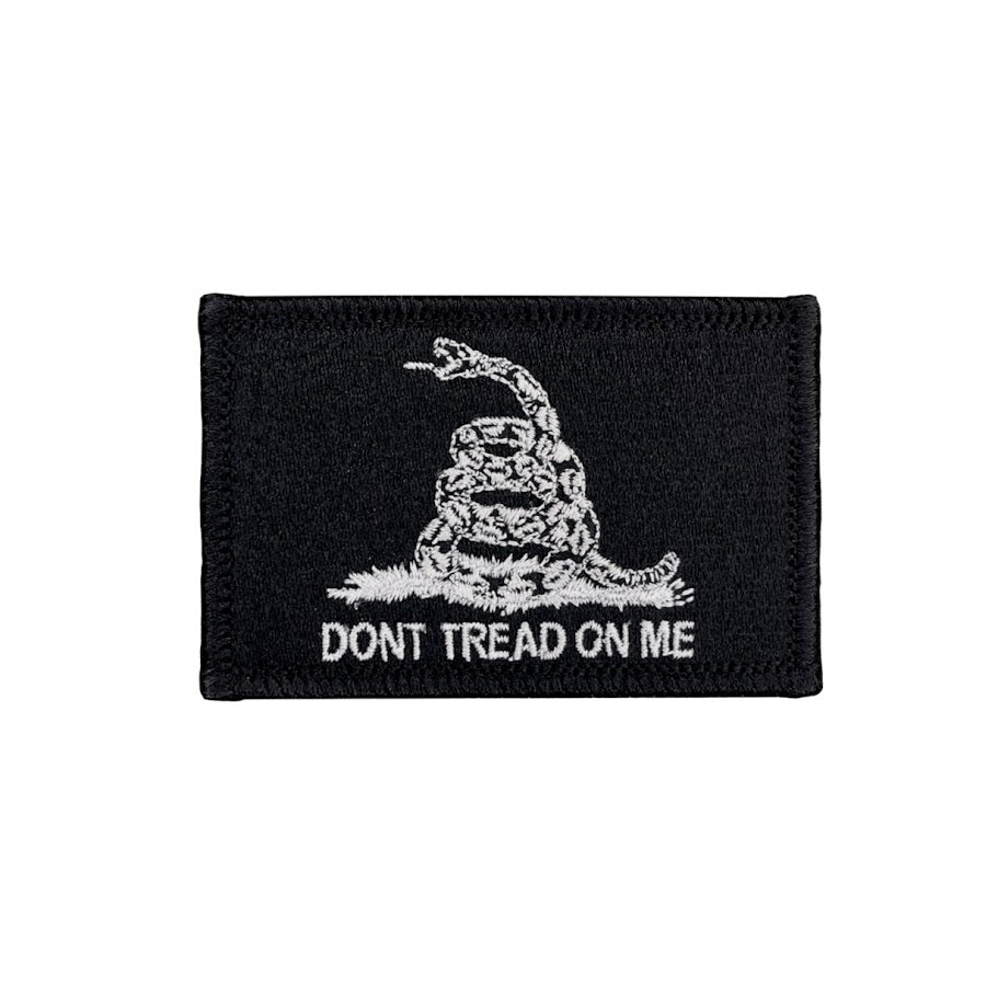 Black patch with white snake and 'Don't Tread on Me' text on a white background