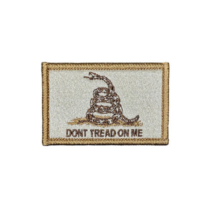 Patch with 'Don't Tread on Me' snake design on a white background