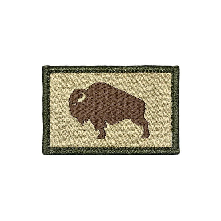 Patch with a silhouette of a bison on a background Multicam