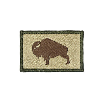 Patch with a silhouette of a bison on a background Multicam